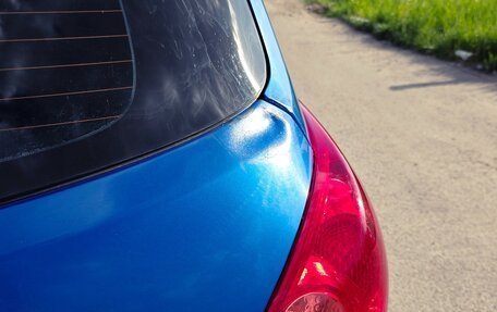 Nissan Tiida, 2007 год, 800 000 рублей, 8 фотография