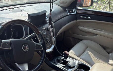 Cadillac SRX II рестайлинг, 2011 год, 490 000 рублей, 4 фотография