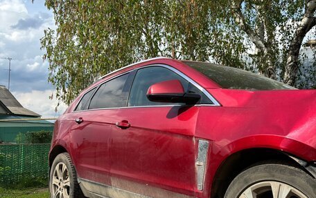 Cadillac SRX II рестайлинг, 2011 год, 490 000 рублей, 3 фотография