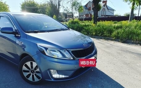 KIA Rio III рестайлинг, 2011 год, 899 000 рублей, 2 фотография