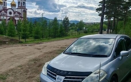 Nissan Tiida, 2010 год, 700 000 рублей, 8 фотография