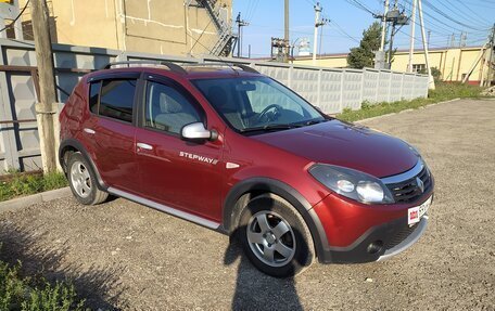 Renault Sandero I, 2012 год, 670 000 рублей, 2 фотография