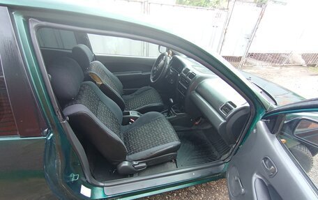 Mazda 323, 1997 год, 330 000 рублей, 8 фотография