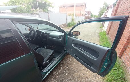 Mazda 323, 1997 год, 330 000 рублей, 9 фотография