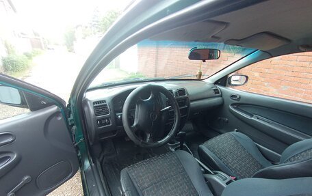 Mazda 323, 1997 год, 330 000 рублей, 10 фотография