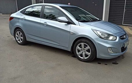 Hyundai Solaris II рестайлинг, 2011 год, 700 000 рублей, 22 фотография