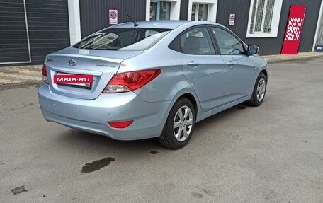 Hyundai Solaris II рестайлинг, 2011 год, 700 000 рублей, 14 фотография