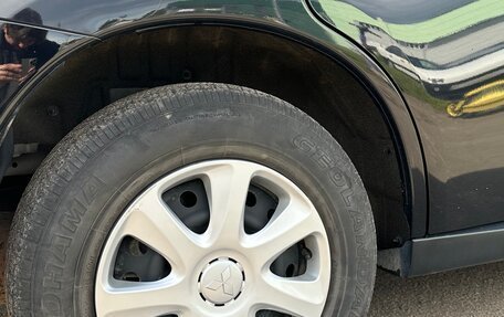Mitsubishi Outlander III рестайлинг 3, 2013 год, 1 700 000 рублей, 14 фотография