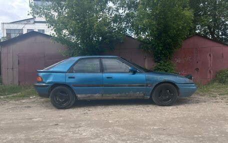 Mazda 323, 1992 год, 139 999 рублей, 2 фотография