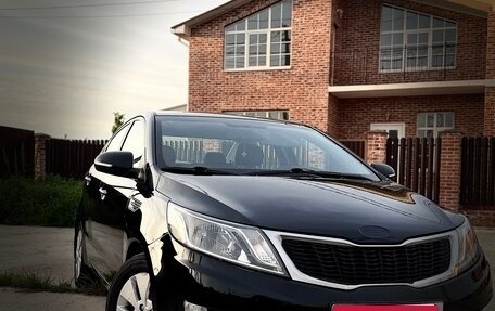 KIA Rio III рестайлинг, 2013 год, 730 000 рублей, 1 фотография