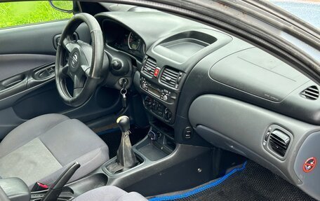 Nissan Almera, 2004 год, 17 фотография