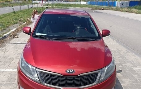 KIA Rio III рестайлинг, 2012 год, 900 000 рублей, 19 фотография