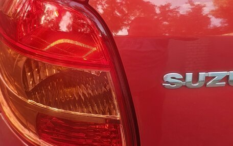 Suzuki SX4 II рестайлинг, 2010 год, 997 000 рублей, 22 фотография