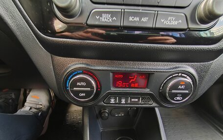 KIA Rio III рестайлинг, 2013 год, 995 000 рублей, 18 фотография
