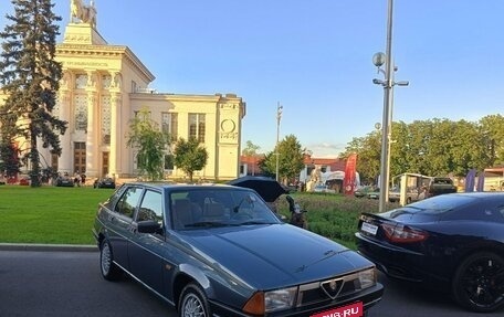 Alfa Romeo 75 I рестайлинг, 1987 год, 1 000 000 рублей, 1 фотография