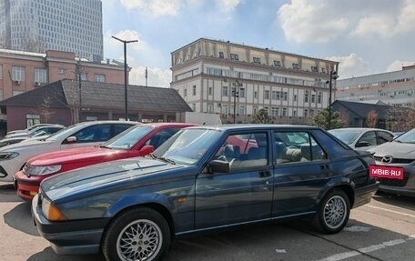 Alfa Romeo 75 I рестайлинг, 1987 год, 1 000 000 рублей, 13 фотография