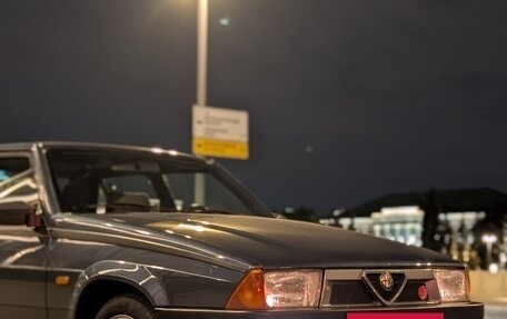 Alfa Romeo 75 I рестайлинг, 1987 год, 1 000 000 рублей, 16 фотография