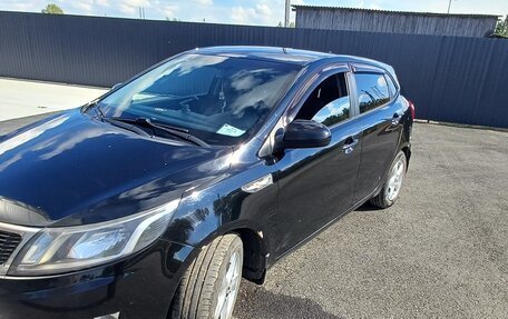 KIA Rio III рестайлинг, 2013 год, 700 000 рублей, 4 фотография