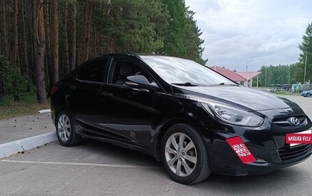 Hyundai Solaris II рестайлинг, 2011 год, 620 000 рублей, 4 фотография