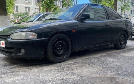 Mitsubishi Mirage VI рестайлинг, 2000 год, 310 000 рублей, 1 фотография