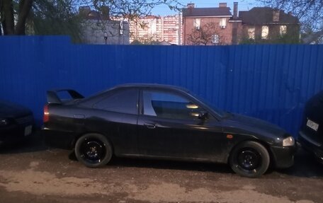 Mitsubishi Mirage VI рестайлинг, 2000 год, 310 000 рублей, 7 фотография