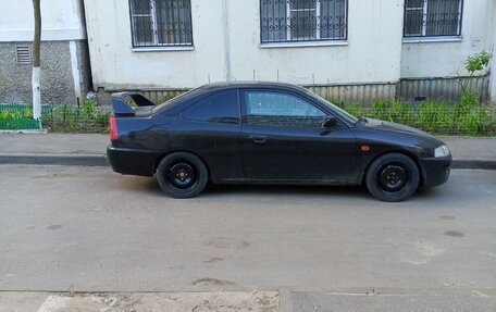 Mitsubishi Mirage VI рестайлинг, 2000 год, 310 000 рублей, 6 фотография