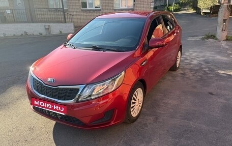 KIA Rio III рестайлинг, 2012 год, 640 000 рублей, 10 фотография