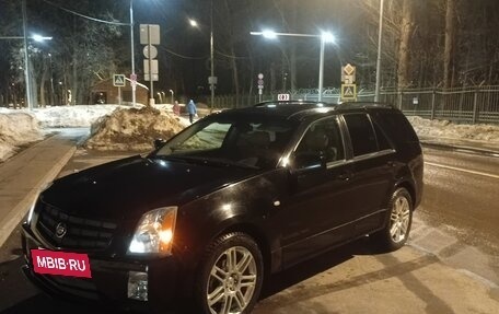 Cadillac SRX II рестайлинг, 2007 год, 900 000 рублей, 9 фотография