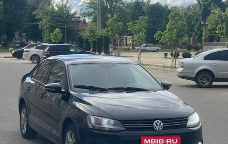 Volkswagen Jetta VI, 2011 год, 890 000 рублей, 3 фотография