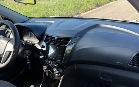 Hyundai Solaris II рестайлинг, 2011 год, 599 000 рублей, 29 фотография