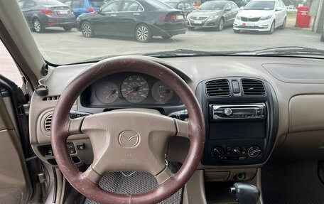 Mazda Protege, 1999 год, 209 000 рублей, 9 фотография