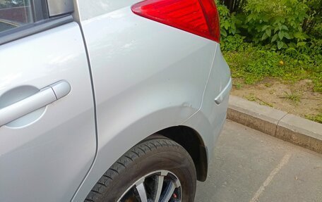 Nissan Tiida, 2012 год, 850 000 рублей, 27 фотография