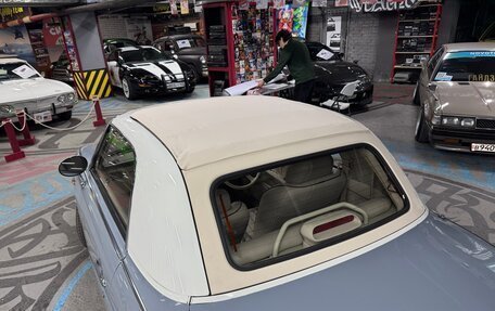 Nissan Figaro, 1991 год, 1 800 000 рублей, 34 фотография