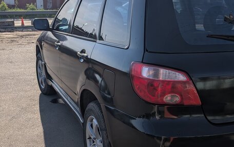 Mitsubishi Outlander III рестайлинг 3, 2006 год, 650 000 рублей, 2 фотография