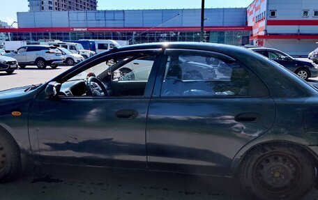 Mazda 323, 1998 год, 130 000 рублей, 7 фотография