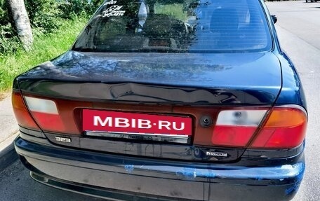 Mazda 323, 1998 год, 130 000 рублей, 14 фотография