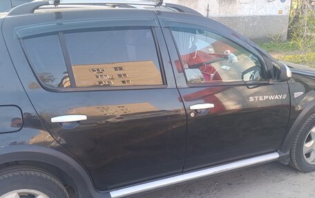Renault Sandero I, 2013 год, 610 000 рублей, 2 фотография
