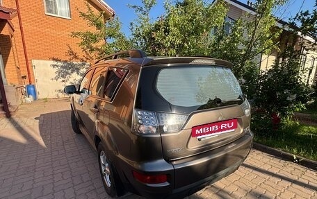 Mitsubishi Outlander III рестайлинг 3, 2011 год, 900 000 рублей, 4 фотография