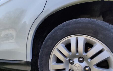 Mitsubishi ASX I рестайлинг, 2011 год, 1 000 000 рублей, 11 фотография