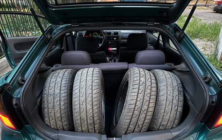 Mazda 323, 1997 год, 270 000 рублей, 12 фотография