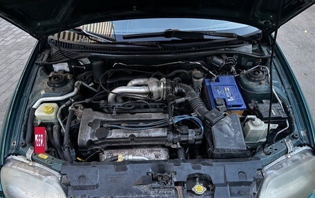 Mazda 323, 1997 год, 270 000 рублей, 13 фотография