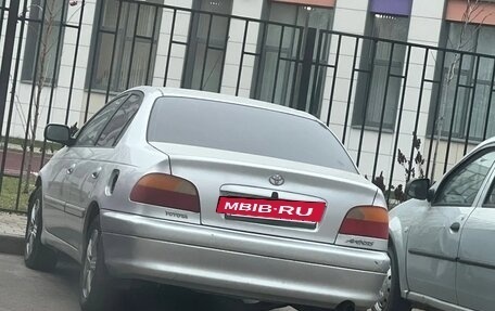 Toyota Avensis III рестайлинг, 1999 год, 160 000 рублей, 17 фотография