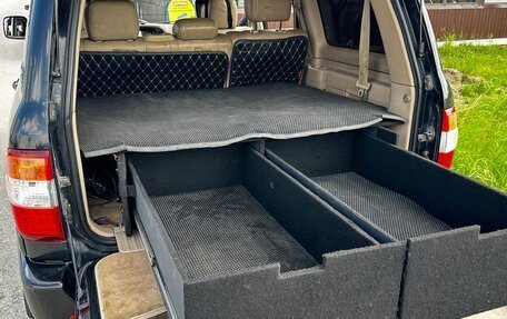 Toyota Land Cruiser 100 рестайлинг 2, 1999 год, 899 000 рублей, 13 фотография