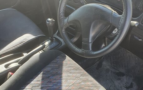 Mitsubishi Mirage VI рестайлинг, 1998 год, 180 000 рублей, 7 фотография