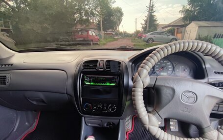 Mazda Familia, 2000 год, 250 000 рублей, 11 фотография