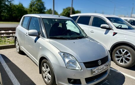Suzuki Swift III, 2010 год, 629 000 рублей, 2 фотография