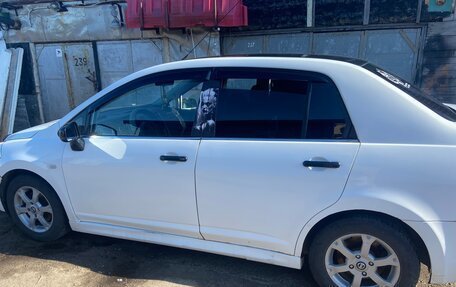 Nissan Tiida, 2010 год, 550 000 рублей, 1 фотография