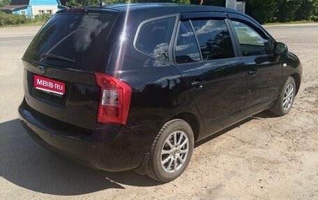 KIA Carens III (RP), 2010 год, 670 000 рублей, 1 фотография