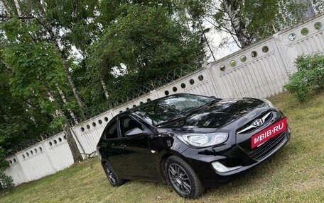 Hyundai Solaris II рестайлинг, 2011 год, 690 000 рублей, 3 фотография