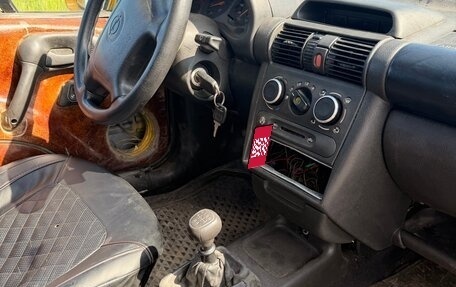 Opel Tigra, 1996 год, 90 000 рублей, 7 фотография